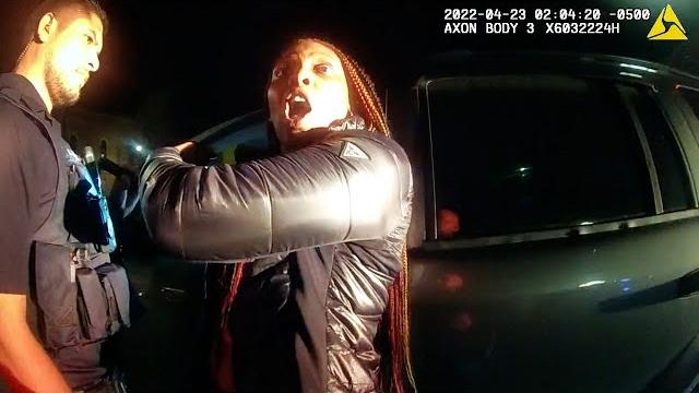 Woman interrupts traffic stop then gets herself arrested Woman interrupts traffic stop then gets herself arrested