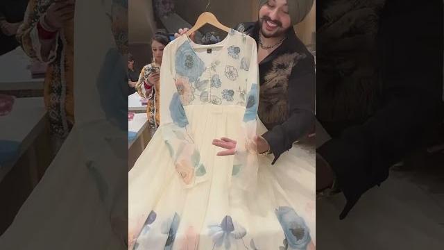 Off white & blue chiffon floral print full flair anarkali suit with hand embroidery work on neck & Off white & blue chiffon floral print full flair anarkali suit with hand embroidery work on neck &