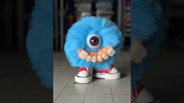 One eyed hairy pom pom blob One eyed hairy pom pom blob