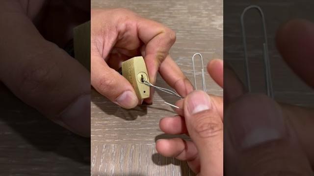 Pick open a lock with a paper clip #shorts Pick open a lock with a paper clip #shorts