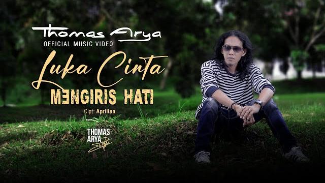 Thomas arya - luka cinta mengiris hati ( official music video ) tak sanggup aku menahan Thomas arya - luka cinta mengiris hati ( official music video ) tak sanggup aku menahan