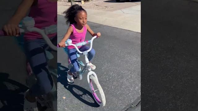 Her first time riding a bike! Her first time riding a bike!
