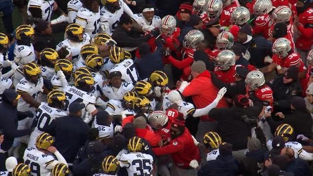 Ohio state vs. michigan fight: players brawl after michigan players try to plant flag at midfield Ohio state vs. michigan fight: players brawl after michigan players try to plant flag at midfield