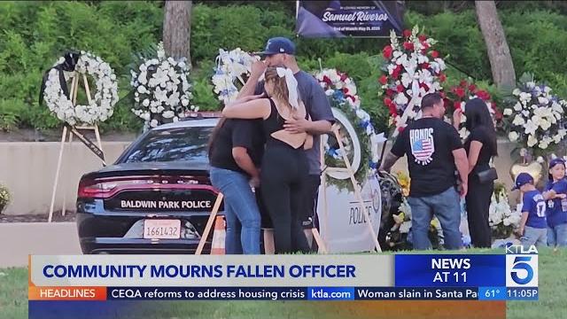 Baldwin park mourns fallen police officer Baldwin park mourns fallen police officer