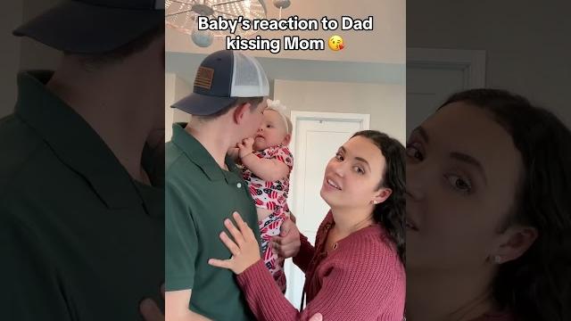 Baby’s reaction to mom and dad kissing #shorts #babygirl #funny Baby’s reaction to mom and dad kissing #shorts #babygirl #funny