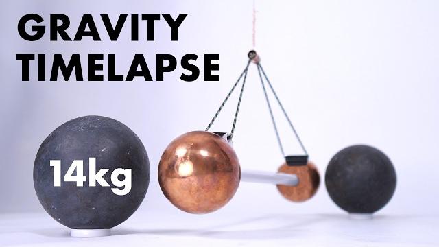 Watch gravity pull two metal balls together Watch gravity pull two metal balls together