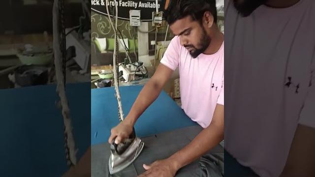 Steam iron on dryclean coat. Steam iron on dryclean coat.