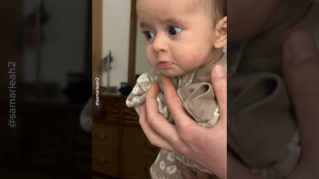 Baby comically defies parents Baby comically defies parents