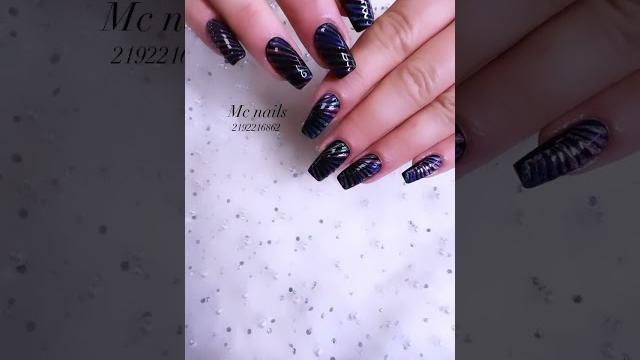 Coffin shaped dark purple nails Coffin shaped dark purple nails