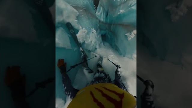 The terrifying moment a skier falls into a glacier crevasse The terrifying moment a skier falls into a glacier crevasse