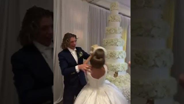 Groom smashes cake in bride's face || viralhog Groom smashes cake in bride's face || viralhog
