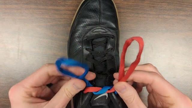 Tying shoes using the bunny ear method Tying shoes using the bunny ear method