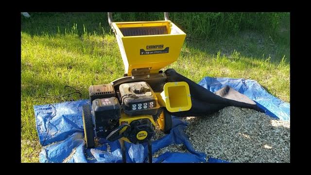 Using a 224cc champion wood chipper Using a 224cc champion wood chipper