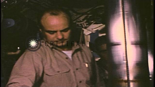 Officer checking and looking through periscope aboard a us submarine underway in ...hd stock footage Officer checking and looking through periscope aboard a us submarine underway in ...hd stock footage