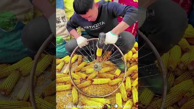 This corn stripping drill & bike wheel contraption is genius! ️ #oddlysatisfying #asmr #corn This corn stripping drill & bike wheel contraption is genius! ️ #oddlysatisfying #asmr #corn