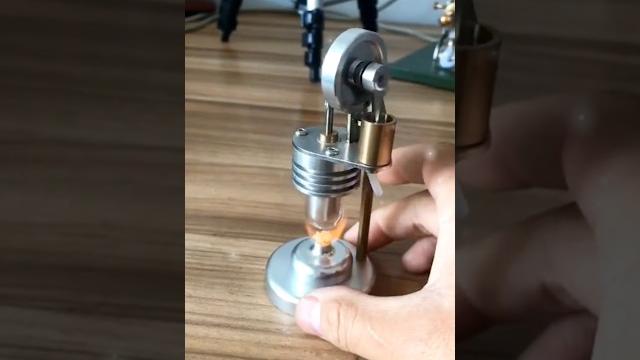 Smallest powerful stirling engine #stirling #engine #model #tractor #perpetualmotion #physics #law Smallest powerful stirling engine #stirling #engine #model #tractor #perpetualmotion #physics #law