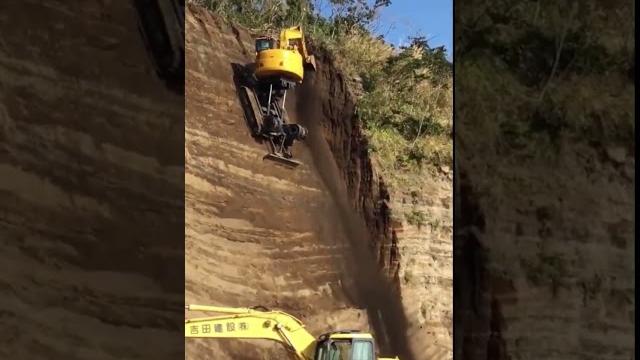 Spider excavator on a cliff Spider excavator on a cliff