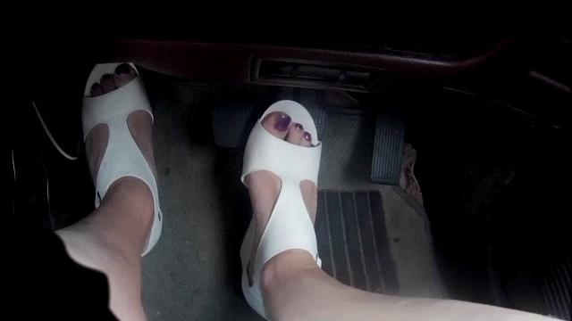 Close up drivin' feet over judder bars Close up drivin' feet over judder bars