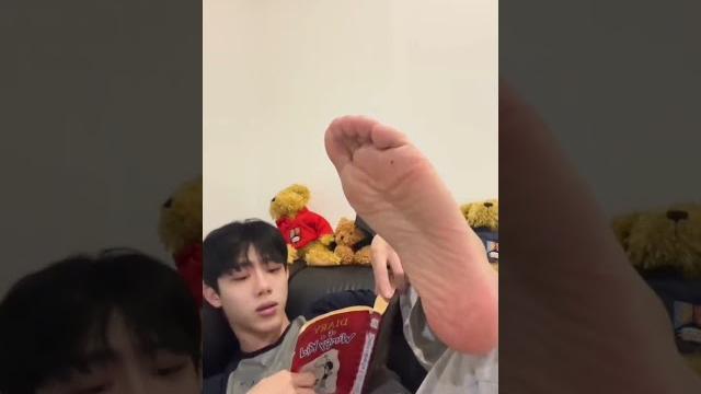 Chinese guy showing his feet Chinese guy showing his feet