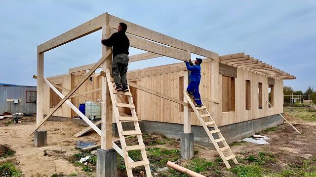 Inexpensive wooden house. full construction process Inexpensive wooden house. full construction process