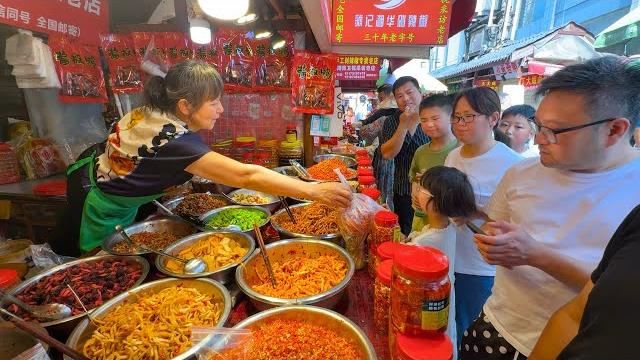 Food market in hunan, china: rich flavors of smoked meats, hearty chicken, and pickled delights Food market in hunan, china: rich flavors of smoked meats, hearty chicken, and pickled delights