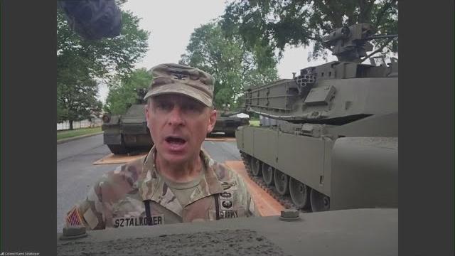 Colonel gives army parade update among tanks in dc Colonel gives army parade update among tanks in dc
