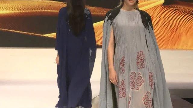 美女一身灰色連衣裙,一對豐滿的乳房,t台上一抖一抖,魔鬼身材搖擺不定! 美女一身灰色連衣裙,一對豐滿的乳房,t台上一抖一抖,魔鬼身材搖擺不定!