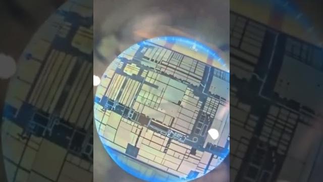 Apple microchip cpu under microscope Apple microchip cpu under microscope