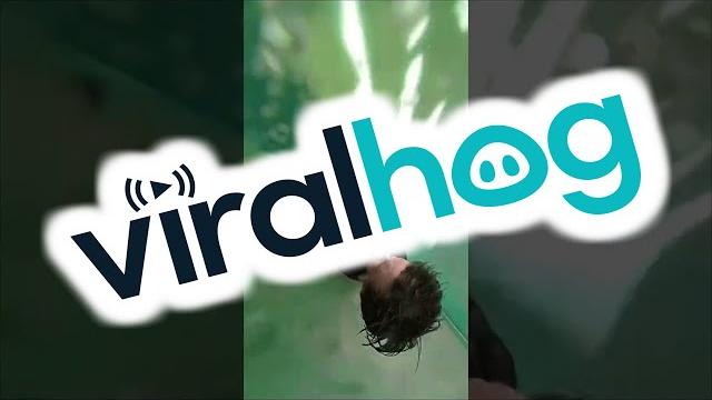 Guy gets stuck in winding water slide || viralhog Guy gets stuck in winding water slide || viralhog