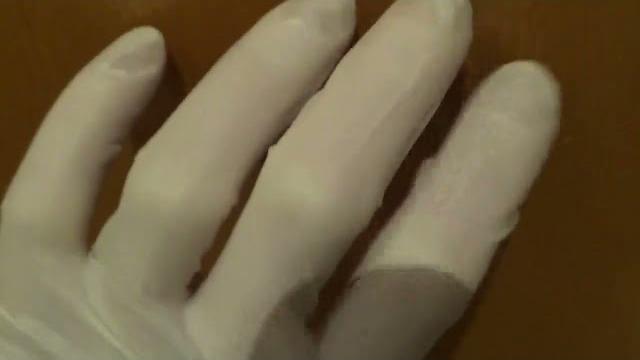 Tapping in latex gloves Tapping in latex gloves