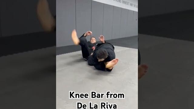 Knee bar from de la riva guard #jiujitsu #bjj #bjjlifestyle #bjj4life #grappling #mma #bjjtechnique Knee bar from de la riva guard #jiujitsu #bjj #bjjlifestyle #bjj4life #grappling #mma #bjjtechnique