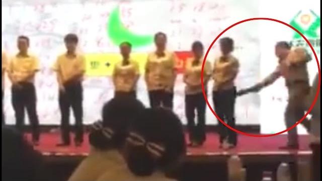 Chinese bank manager spanks employees for poor performance, watch video | oneindia news Chinese bank manager spanks employees for poor performance, watch video | oneindia news