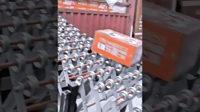 Innovative portable conveyor tool: fast & labor-saving box unloading from truck to warehouse Innovative portable conveyor tool: fast & labor-saving box unloading from truck to warehouse