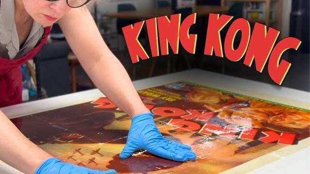 Cleaning a vintage king kong movie poster (1950s) Cleaning a vintage king kong movie poster (1950s)