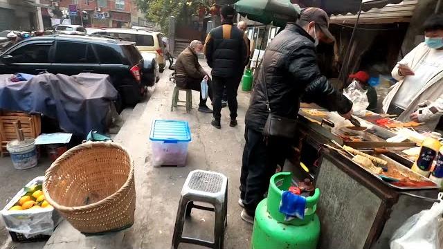 The foot massage parlor in the busy city is open at night, and men come here to spend and relax The foot massage parlor in the busy city is open at night, and men come here to spend and relax